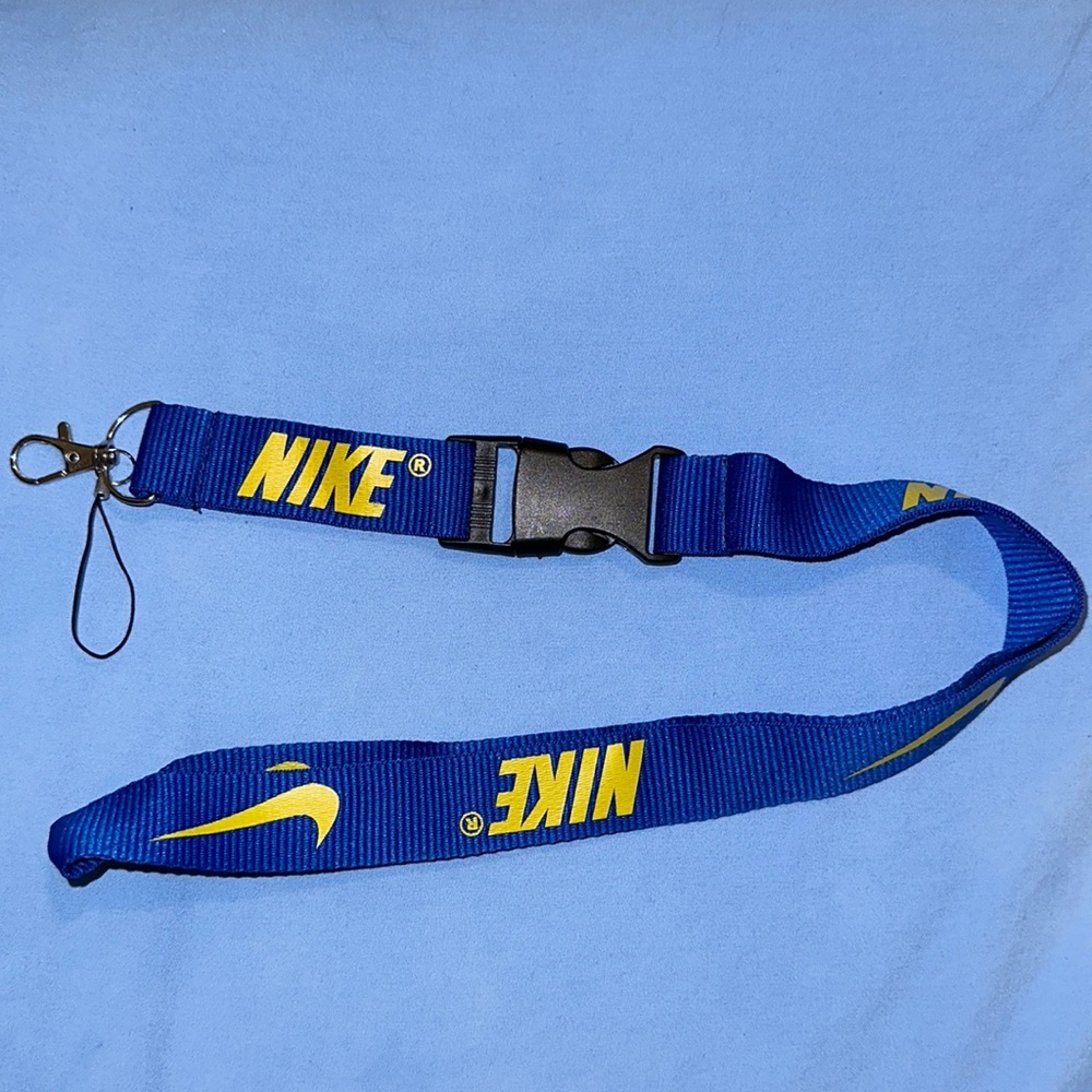 Blue and yellow Nike lanyard